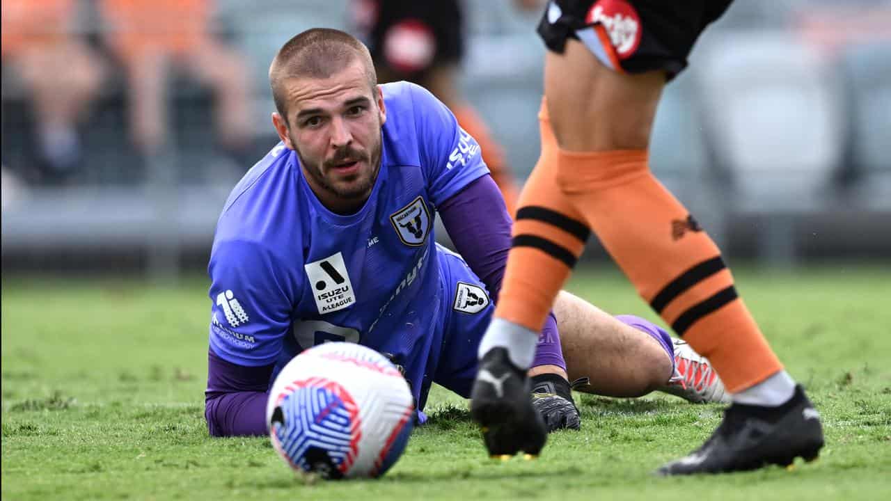 Macarthur keeper Filip Kurto can't stop Florin Berenguer scoring.