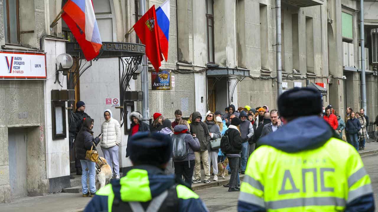 Voters at polling stations in Moscow