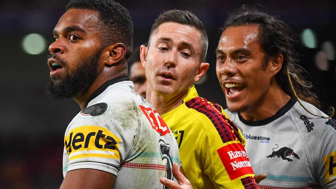 Jarome Luai (right) makes contact with touch judge Chris Sutton