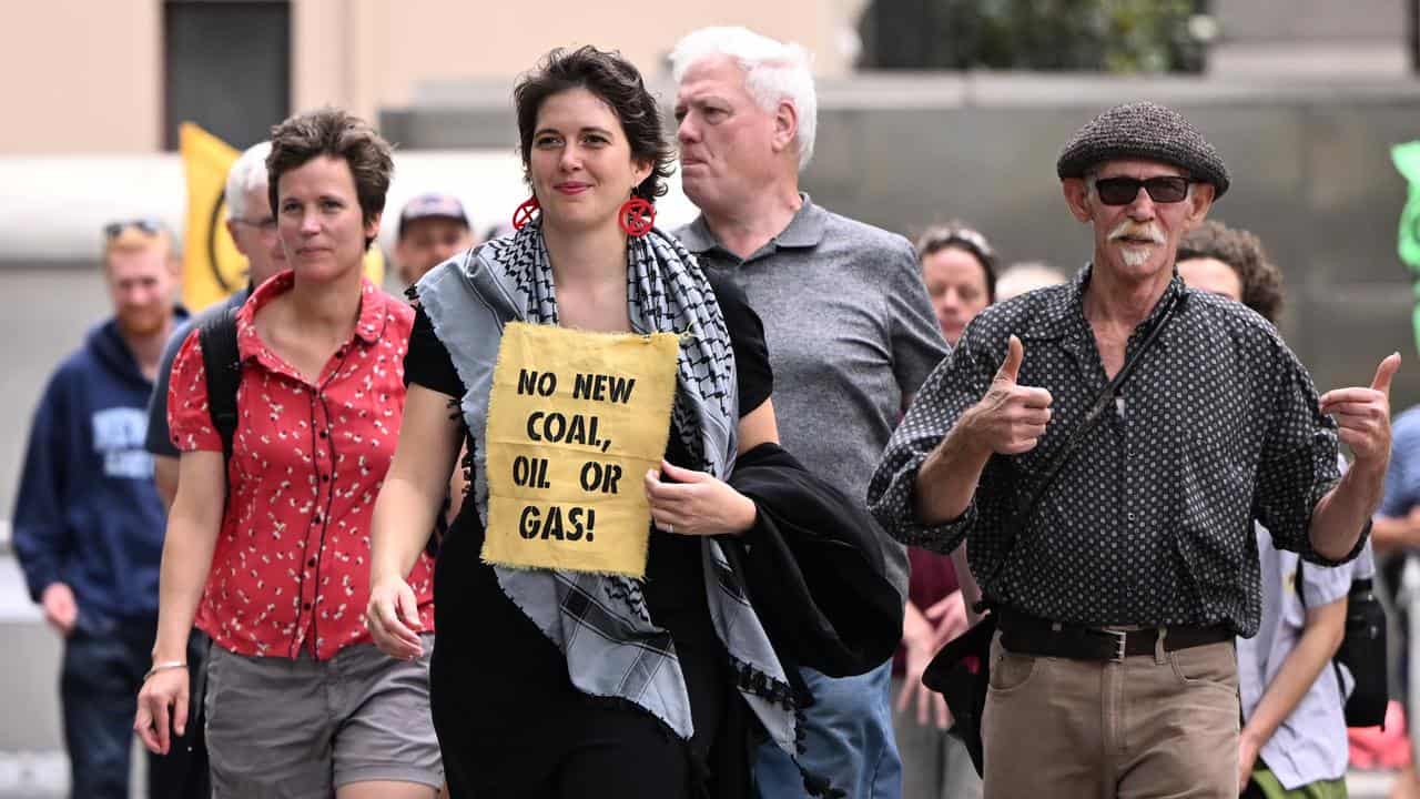 Deanna 'Violet' Coco (centre) with supporters