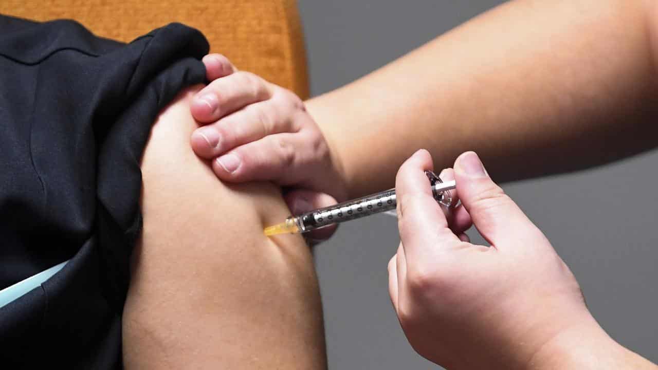 A person gets a COVID-19 vaccination (file image)