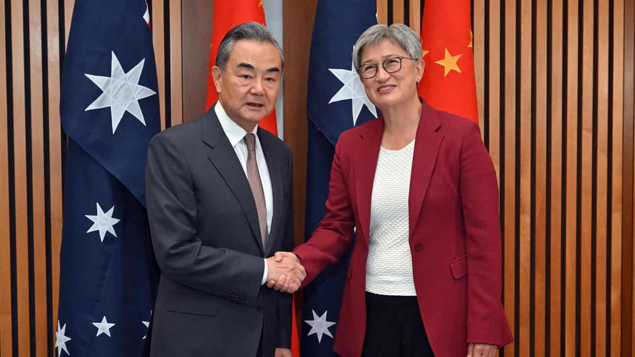 Wang Yi and Penny Wong