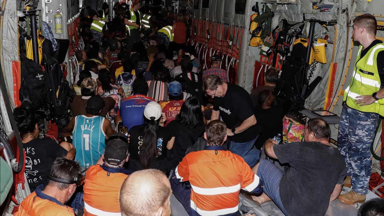 Borroloola residents on a plane bound for Darwin.