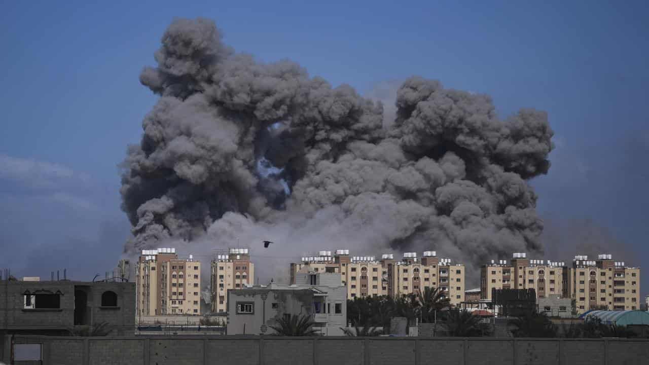 Smoke rises following an Israeli air strike in Gaza