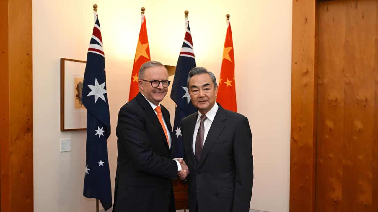 PM Anthony Albanese shakes hands with Chinese Foreign Minister Wang Yi