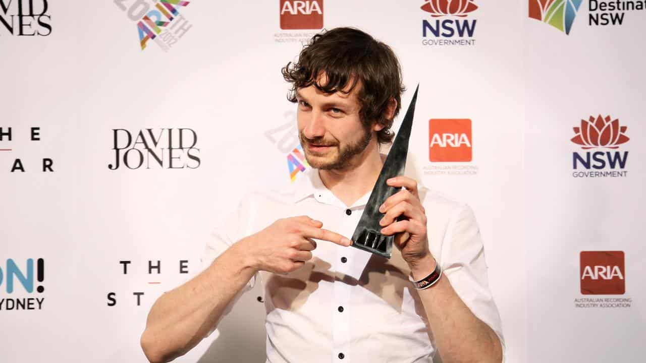 Gotye poses with his ARIA Award in 2012