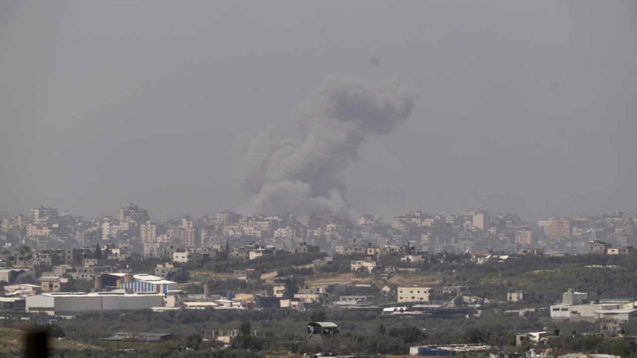 Smoke rises after an explosion in the Gaza Strip