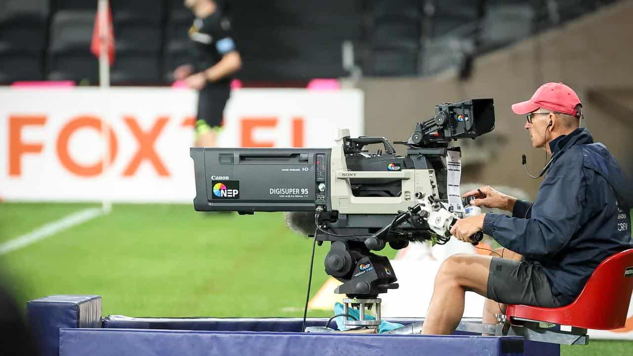 A TV camera operator at an A-League match. 