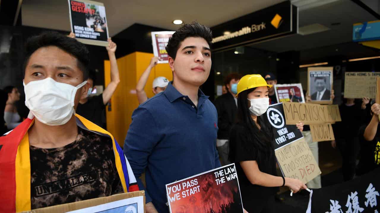 Drew Pavlou takes part in a protest in 2020