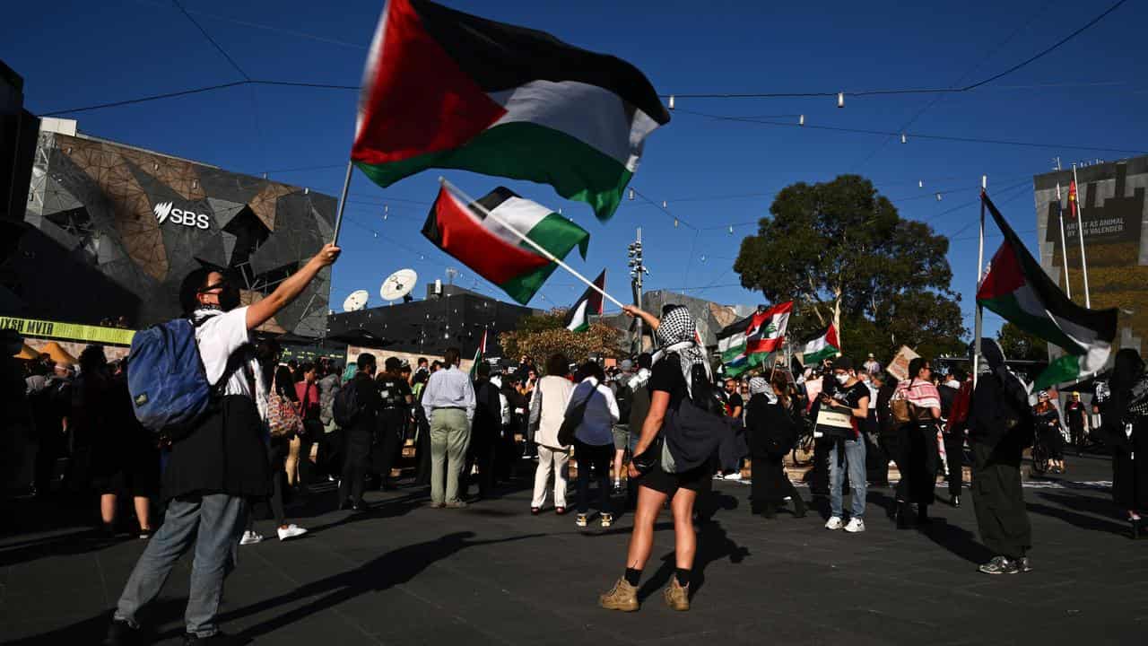 People participate in a pro-Palestinian protest in Melbourne