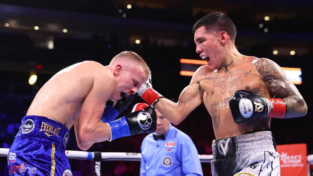 Liam Wilson (left) feels the full force of Oscar Valdez in Arizona.