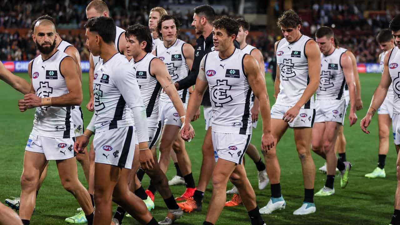 Dejected Carlton players after losing to Adelaide