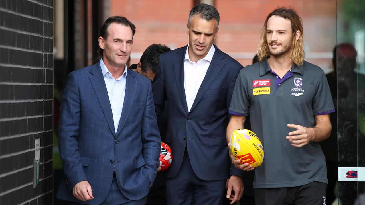 AFL boss Andrew Dillon, SA premier Peter Malinauskas and James Aish.