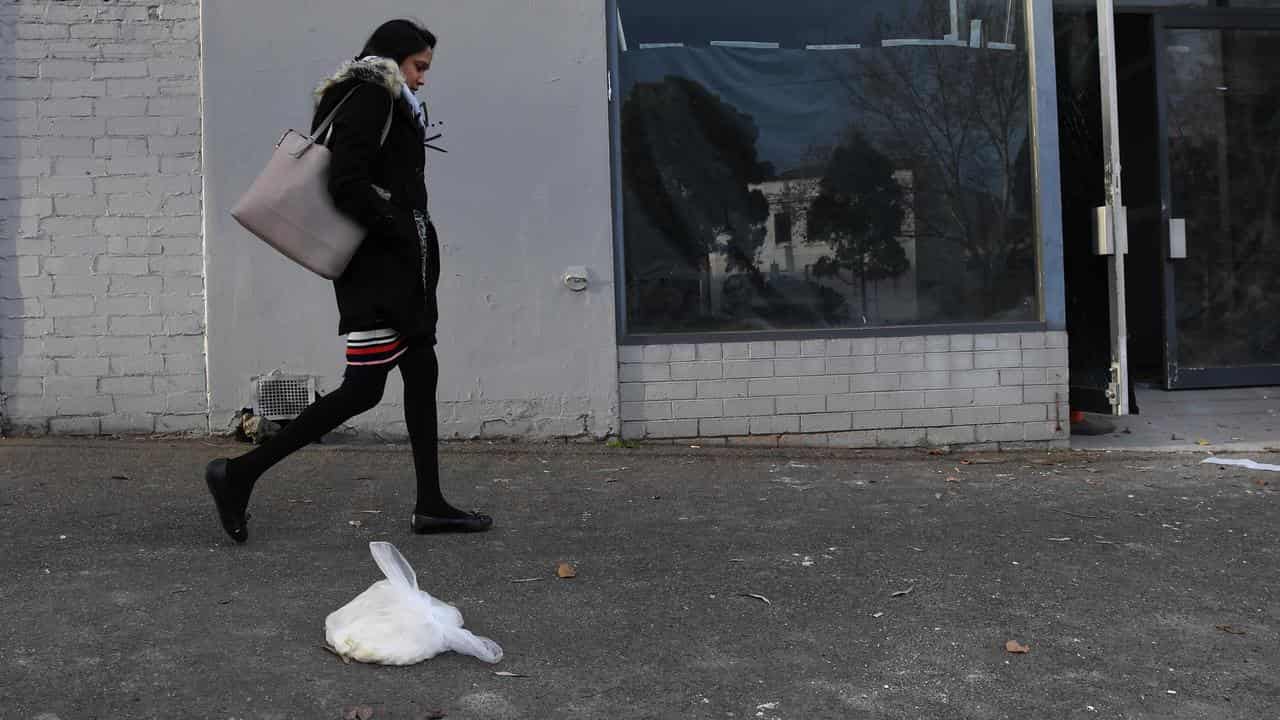 A plastic bag on the ground.