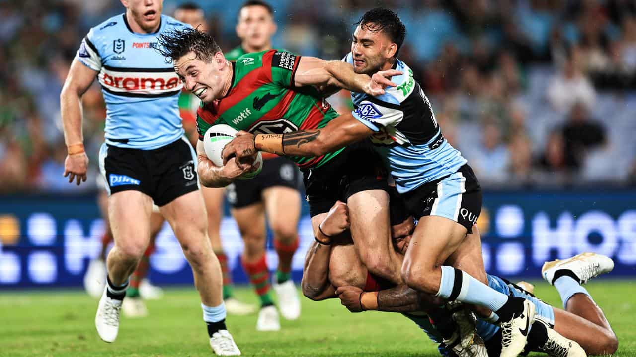 Cameron Murray runs with the ball against the Sharks. 