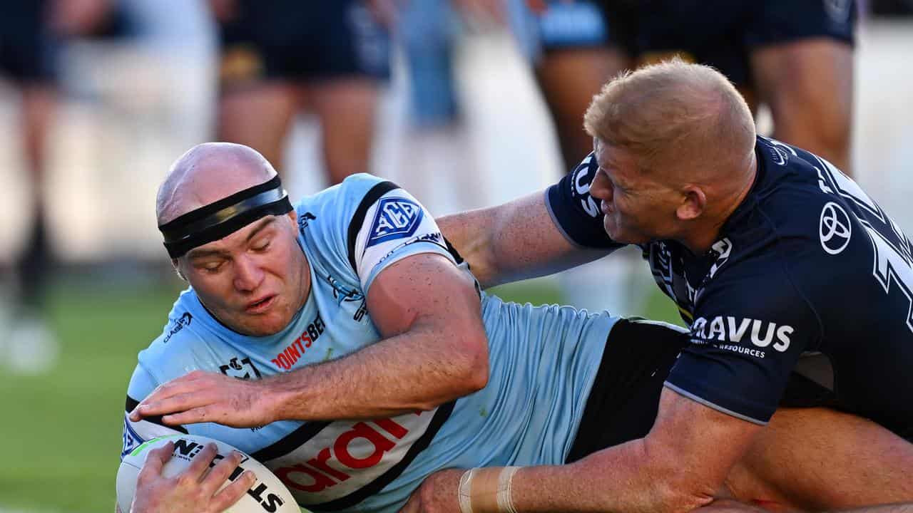 Thomas Hazelton scores a try for Cronulla. 