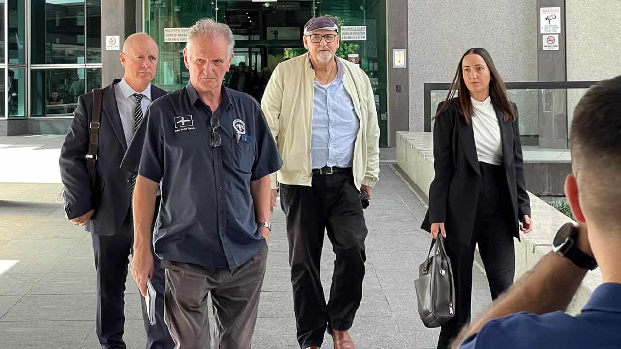 Brisbane City Council bus driver Andrew Rudnicki (second right) 