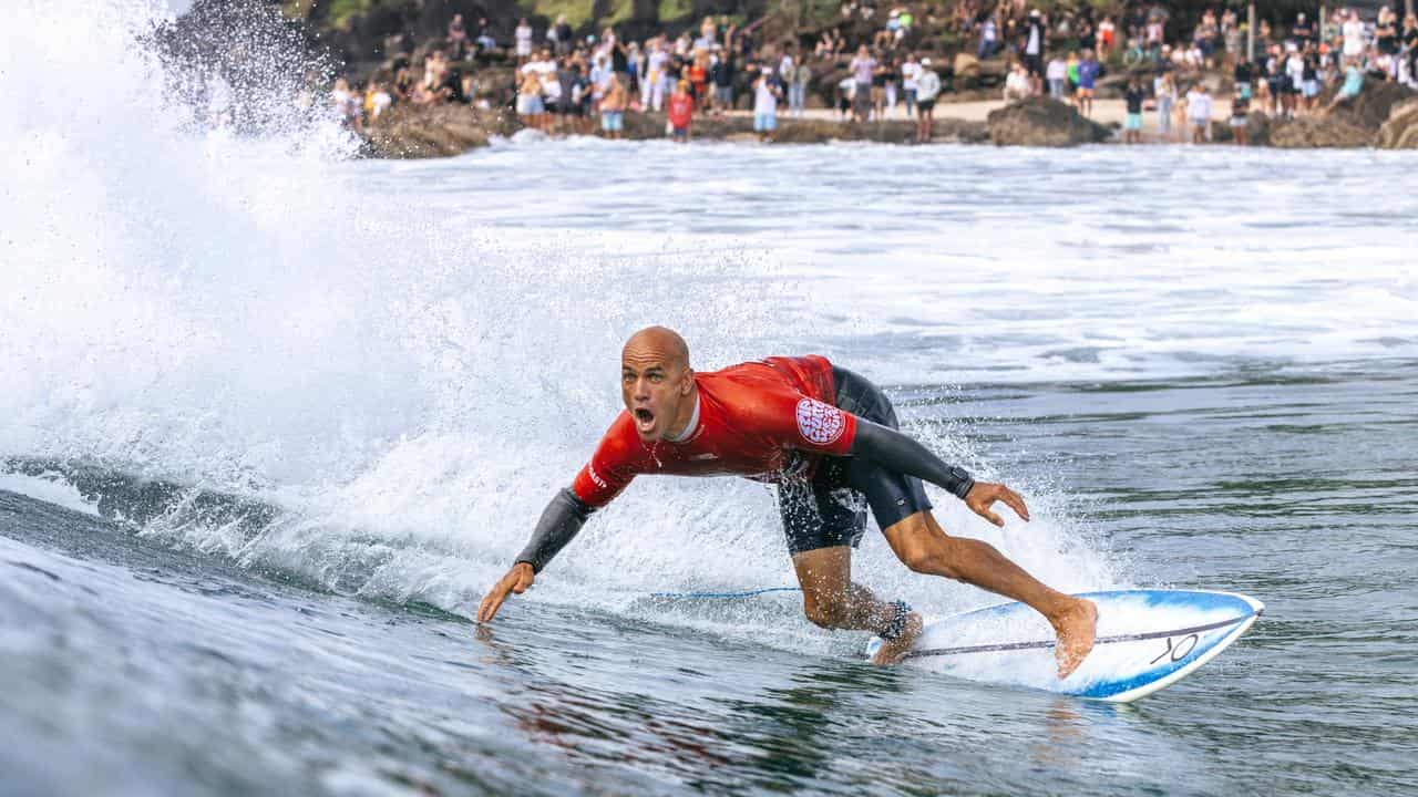 Kelly Slater surfs Snapper Rocks. 