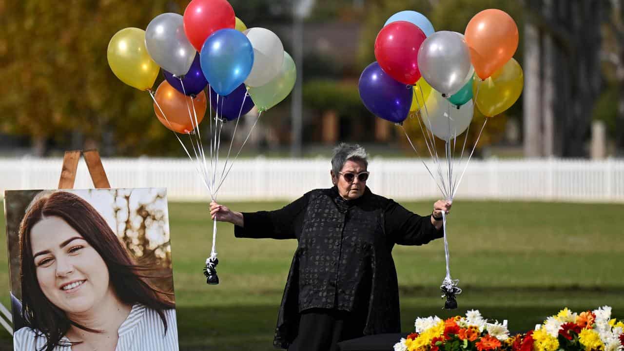 A picture of domestic violence victim Molly Ticehurst at her funeral.