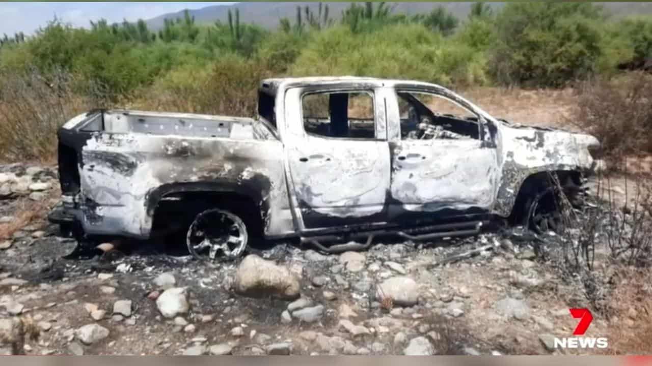 A burnt-out ute.