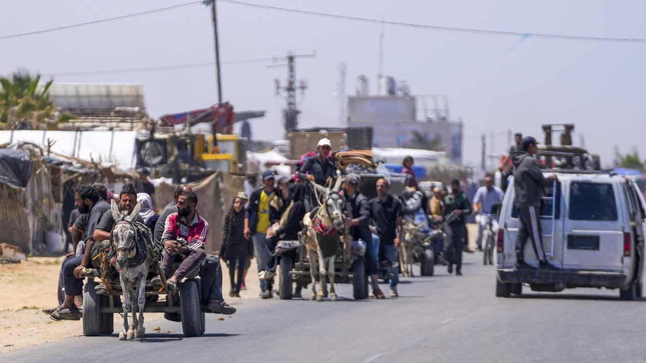 Palestinians arrive in central Gaza after fleeing southern city Rafah