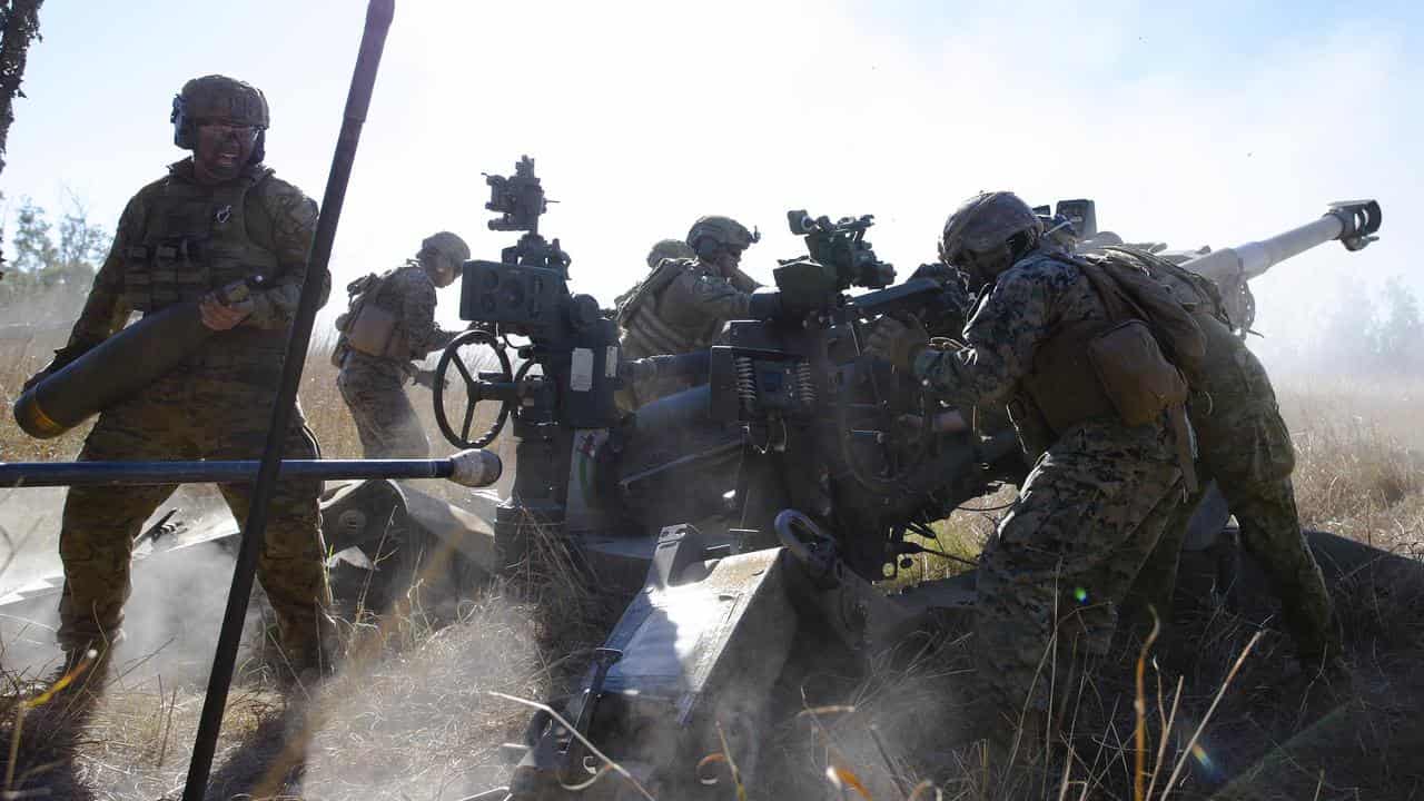 Soldiers fire a Howitzer at Shoalwater Bay in Queensland