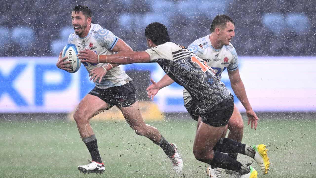 Jake Gordon (left) of the Waratahs. 