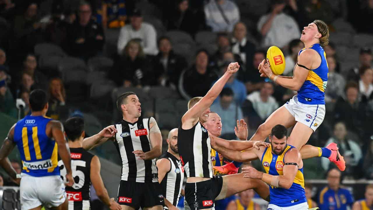 Harley Reid marks the ball for West Coast.