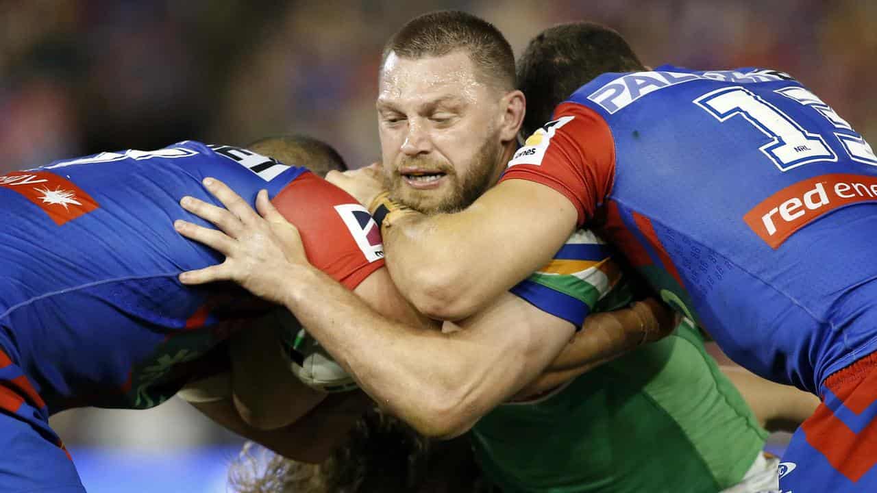 Canberra captain Elliott Whitehead (centre).