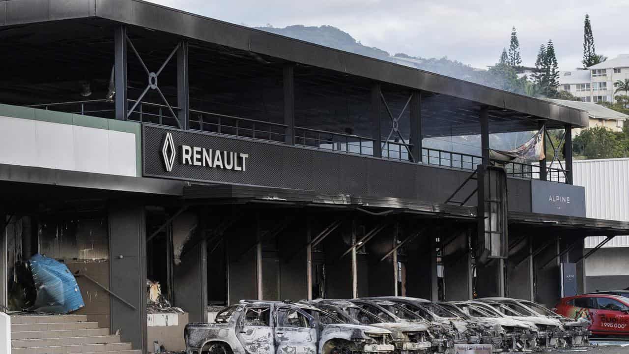 Burnt car dealership in Noumea