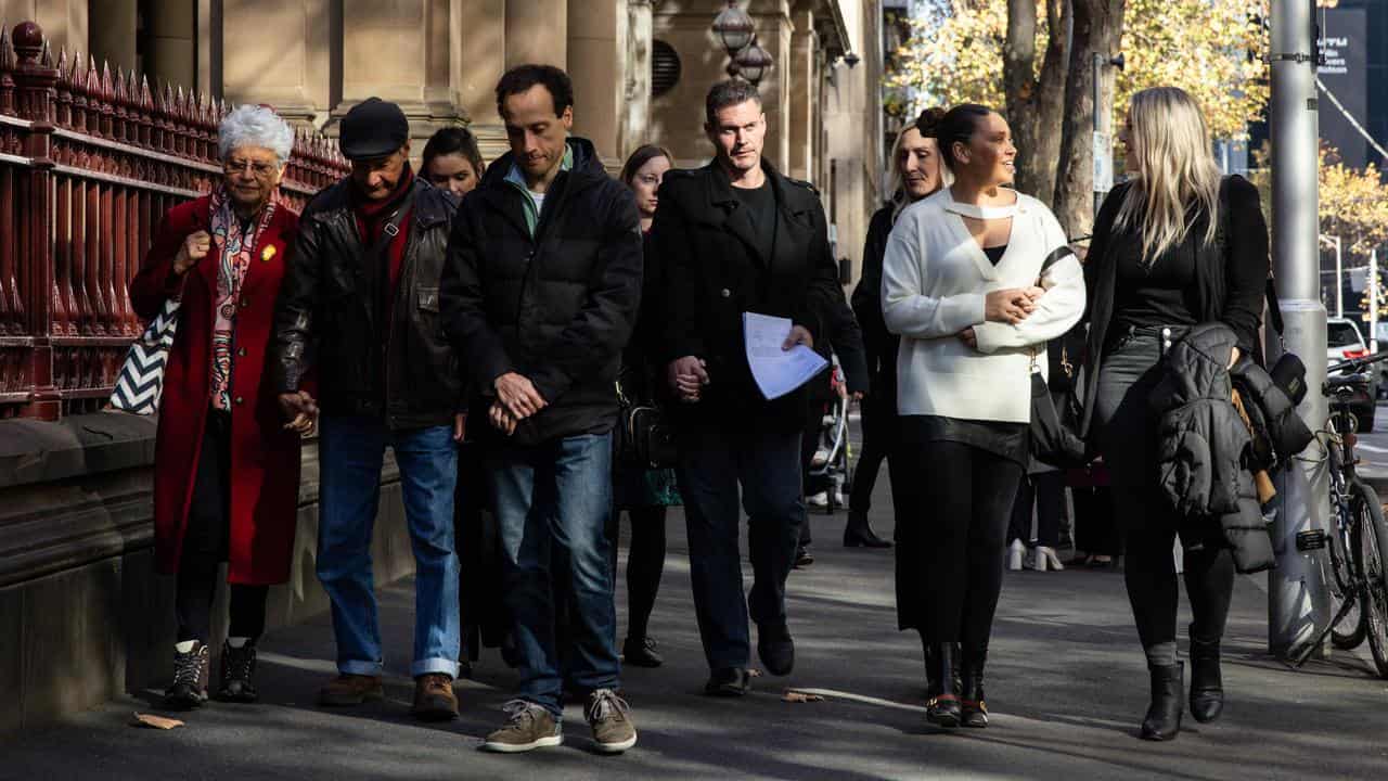 Monique Lezsak's family and friends leave the Supreme Court