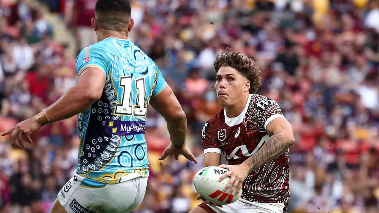 Reece Walsh runs with the ball for Brisbane against Gold Coast.