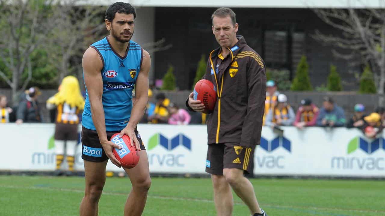 Cyril Rioli at training with Alastair Clarkson.