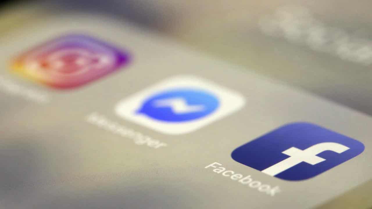 Mobile phone showing Instagram, Facebook and Messenger apps