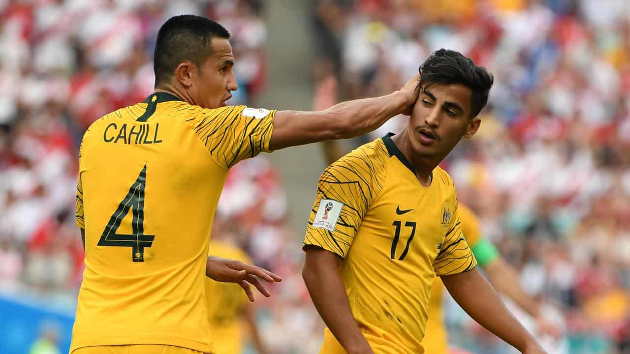 Tim Cahill (left) and Daniel Arzani.