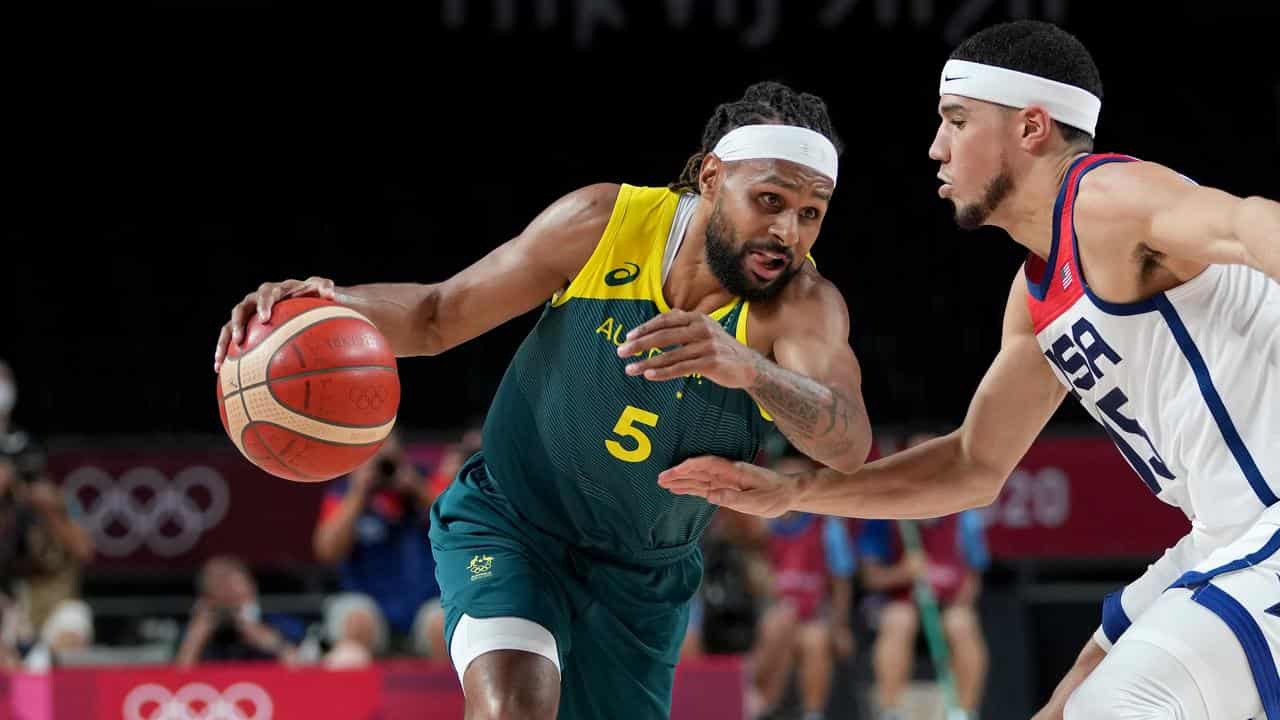 Patty Mills (left) of the Boomers. 