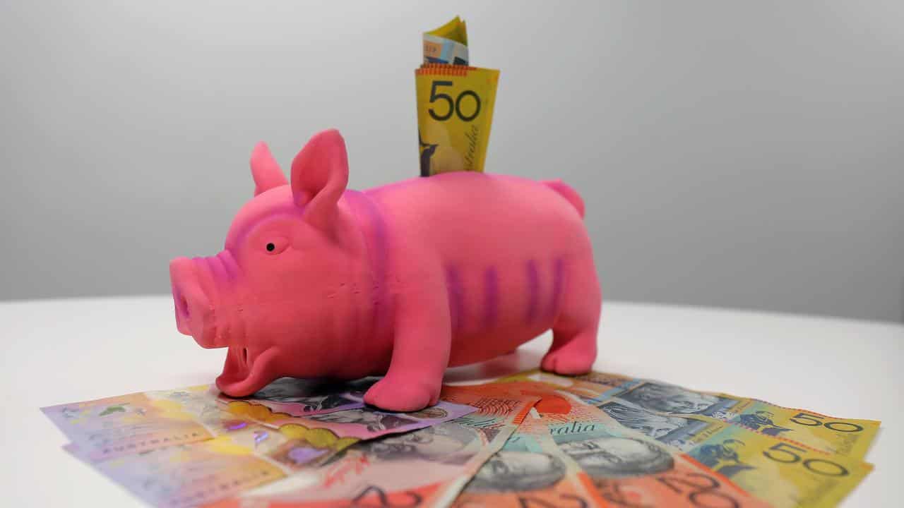 A piggy bank and cash.