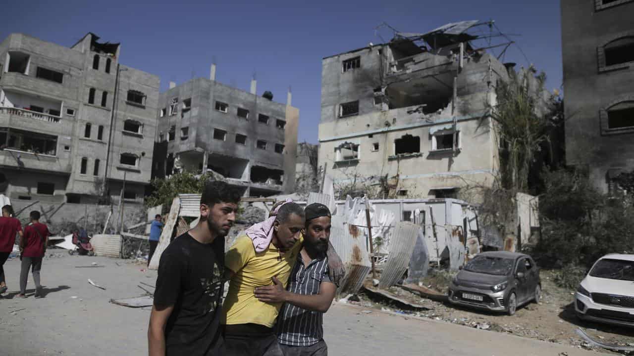 Injured men in Gaza