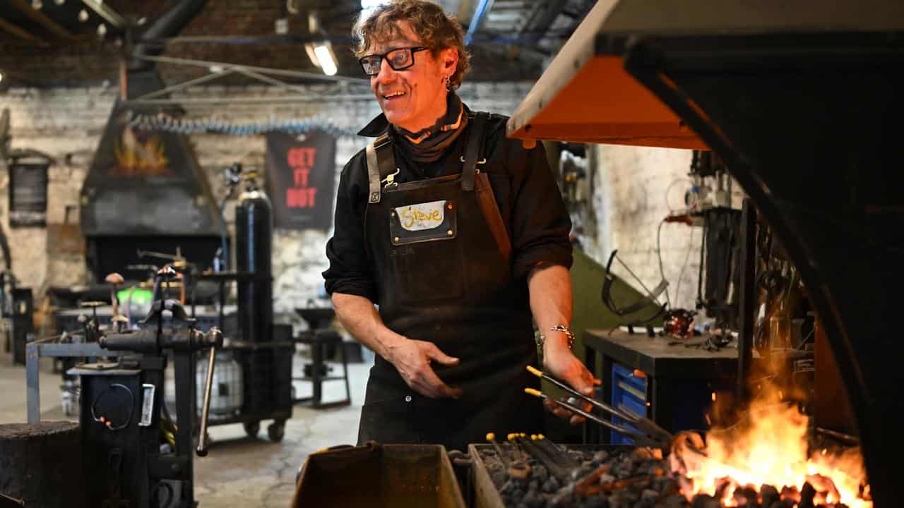 Steve Phillips is seen at work at Waterside Metal Art workshop