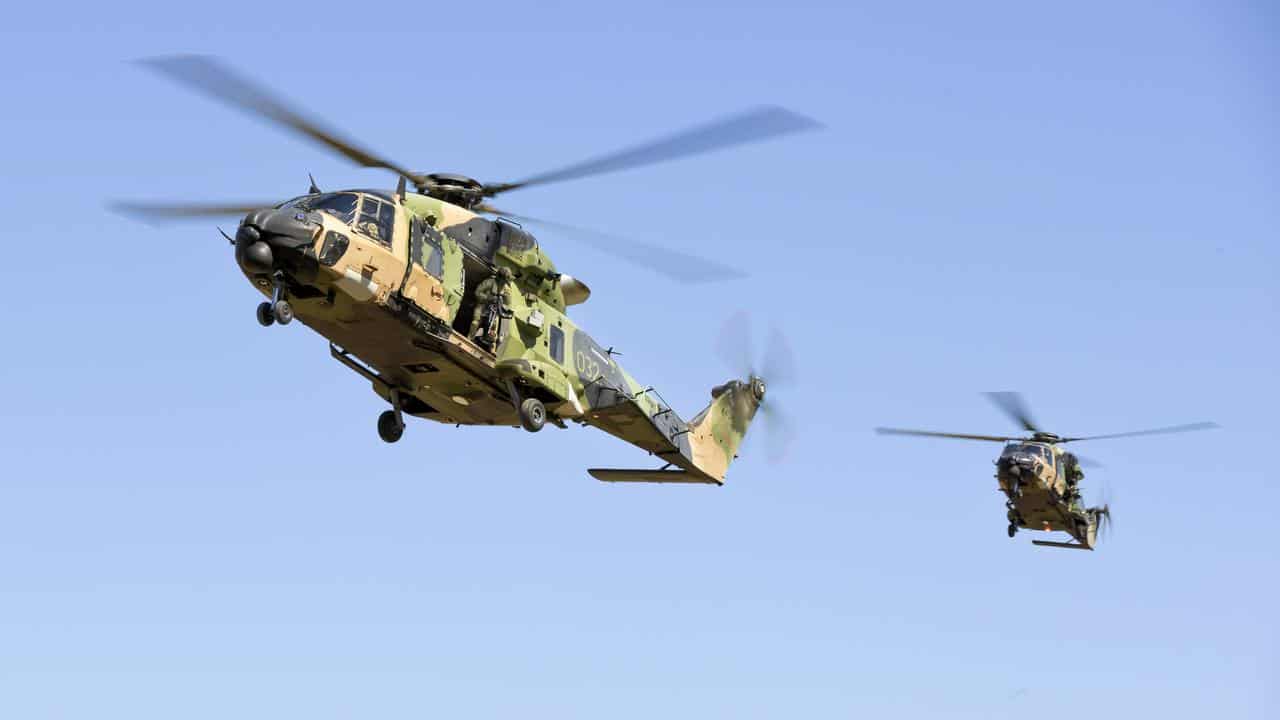 Two Taipan helicopters flying.