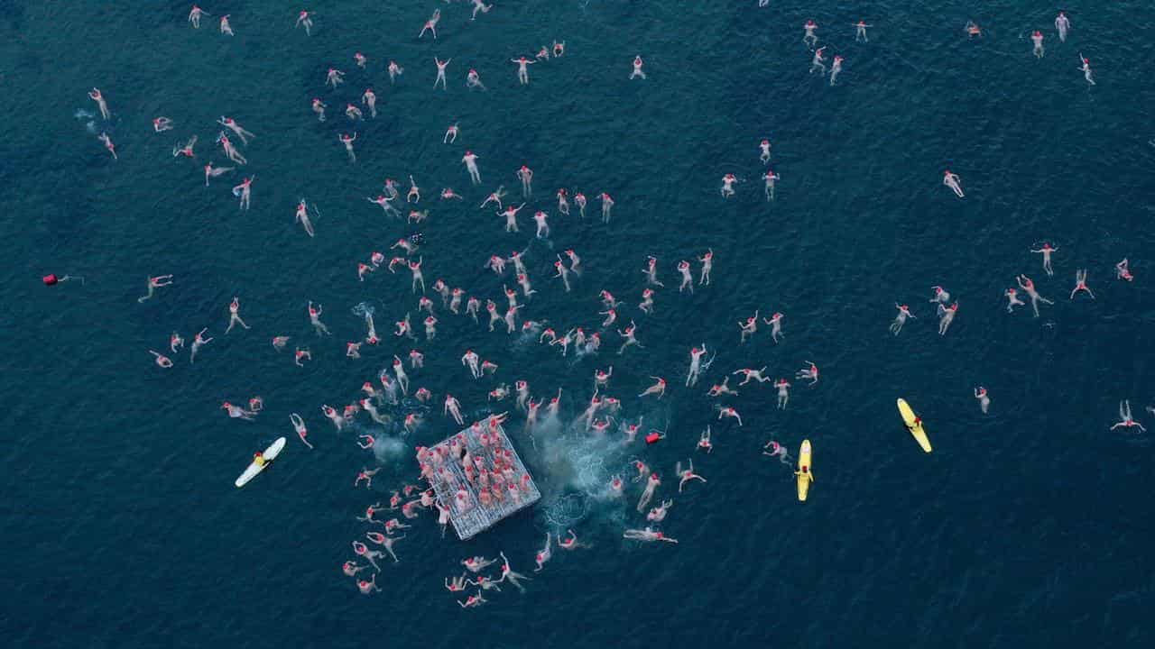 Swimmers during the winter solstice swim 