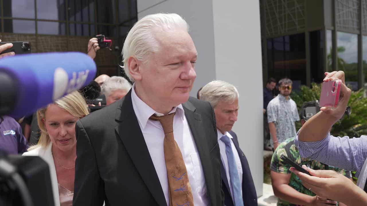 Julian Assange outside court on the US territory of Saipan