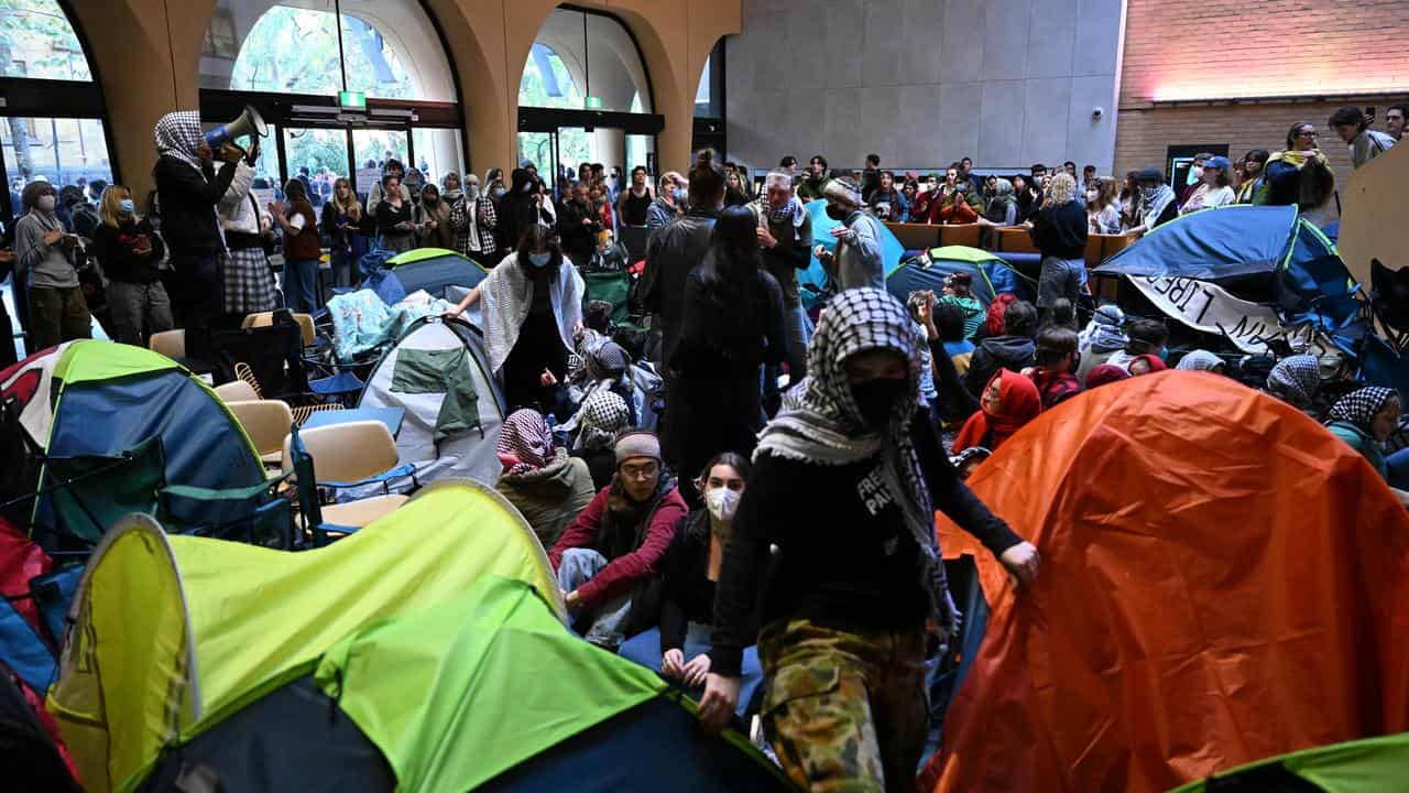 Pro-Palestinian protesters occupying a Melbourne University building