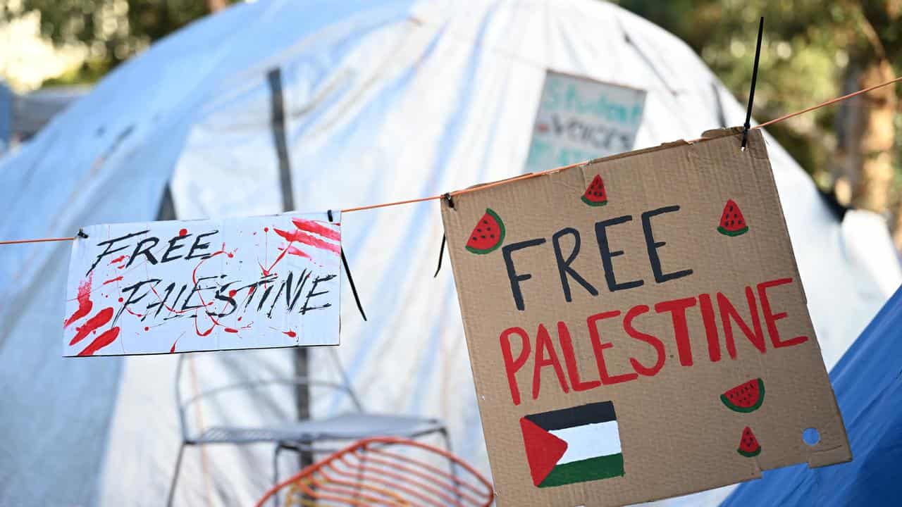 Placards at a pro-Palestinian encampment at Monash University