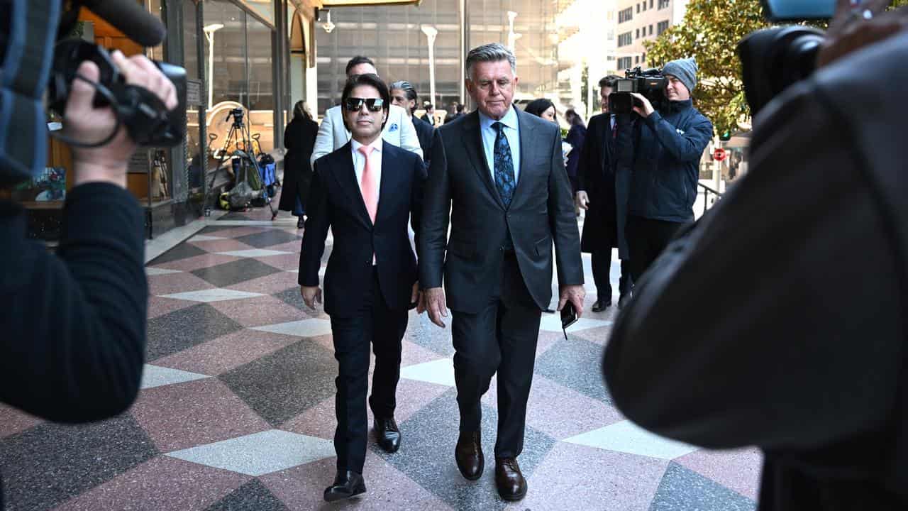 Fadi Ibrahim (left) with his lawyer Greg Goold (right)