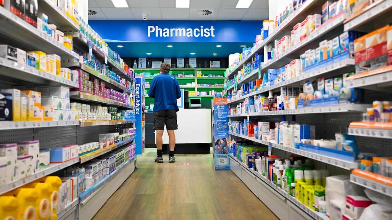 A customer at a National Chemist pharmacy in Canberra.