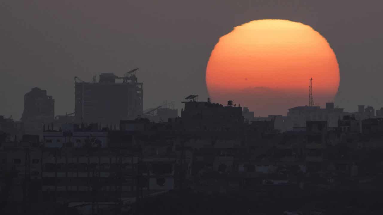 The sun sets behind the Gaza Strip 