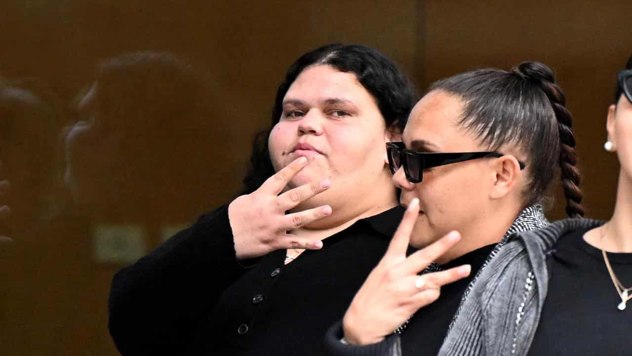 Jamie Lee Brown (left) outside the Brisbane Supreme Court