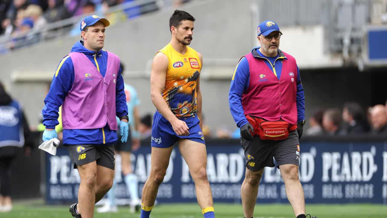 West Coast vice-captain Liam Duggan (centre).