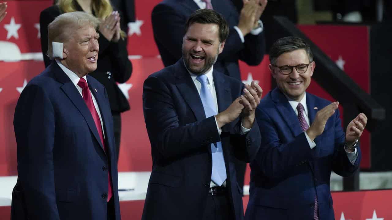 Donald Trump standing with JD Vance at the Republican Convention